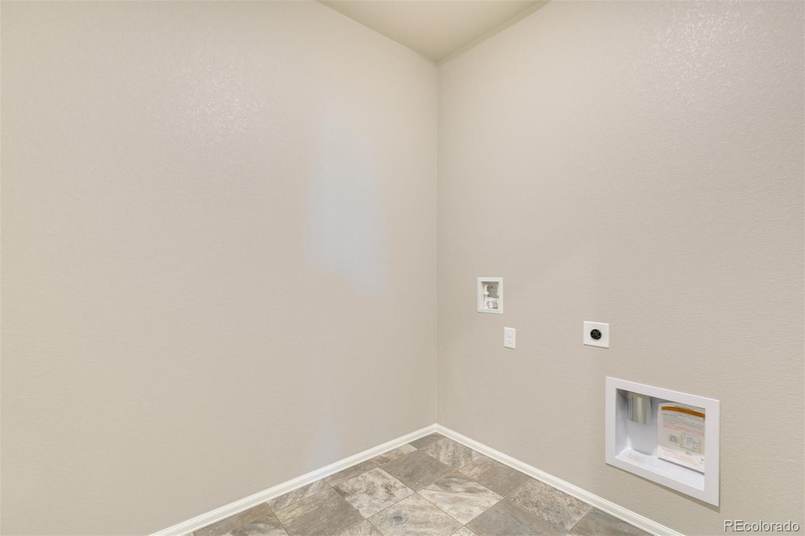 925 Camberly Drive Windsor, CO 80550 - Photo 26 of 29 a view of a small space with wooden floor