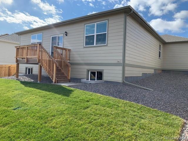 925 Camberly Drive Windsor, CO 80550 - Photo 27 of 29 a front view of house with yard and seating
