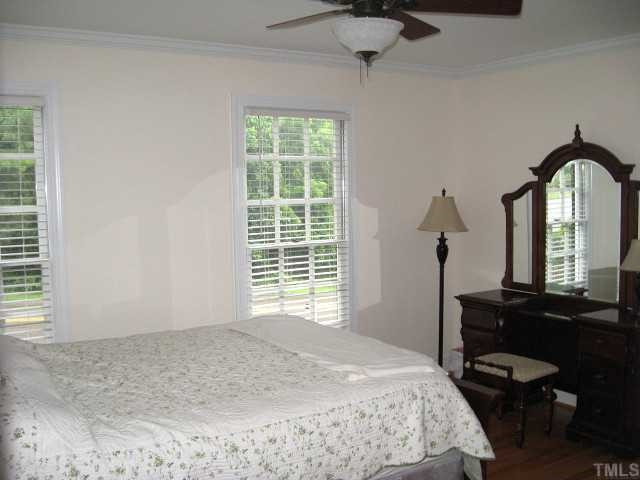 7116 Rainwater Road Raleigh, NC 27615 - Photo 7 of 12 First floor bedroom with walk-in closet & access to full bath Bedroom