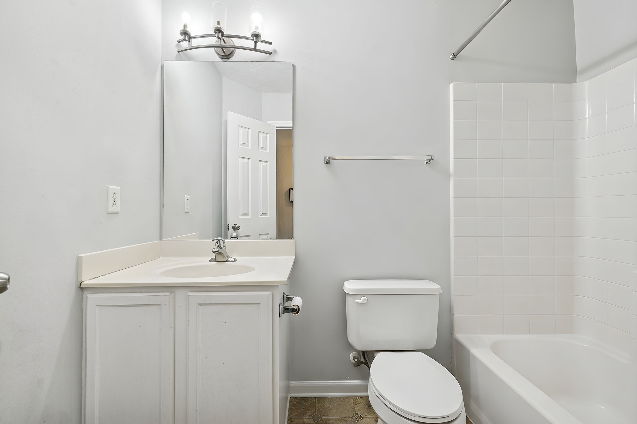 1036 Wolves Den Place Murfreesboro, TN 37128 - Photo 12 of 15 a bathroom with a toilet a sink and bathtub