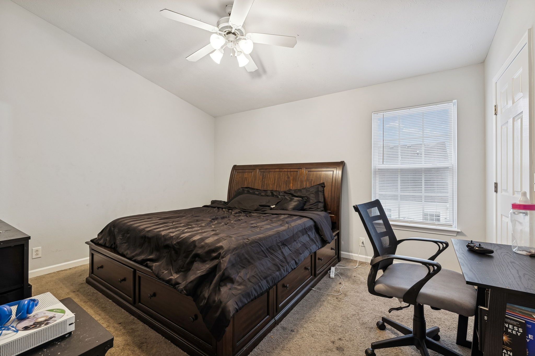 1036 Wolves Den Place Murfreesboro, TN 37128 - Photo 13 of 15 a bedroom with a bed a chair and a chandelier