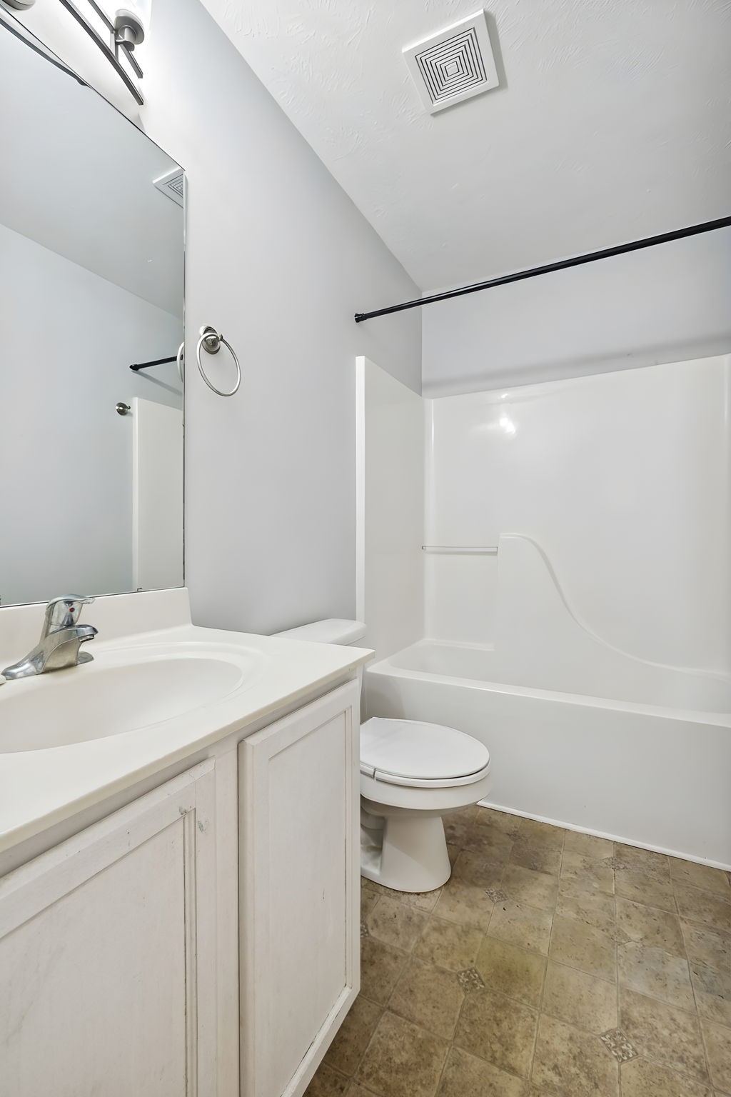 1036 Wolves Den Place Murfreesboro, TN 37128 - Photo 14 of 15 a bathroom with a sink a toilet and a bathtub