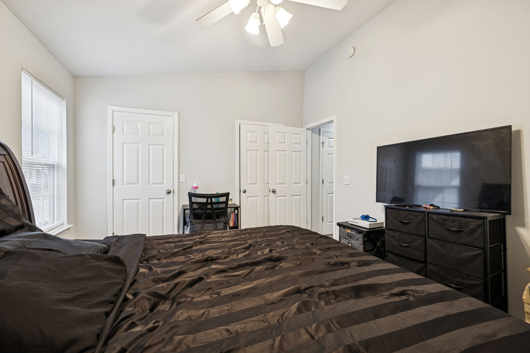 1036 Wolves Den Place Murfreesboro, TN 37128 - Photo 15 of 15 a bedroom with a bed and a flat screen tv