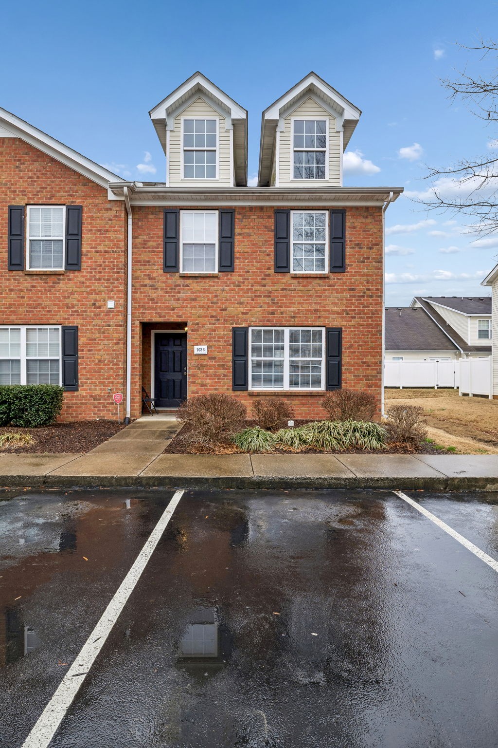 1036 Wolves Den Place Murfreesboro, TN 37128 - Photo 2 of 15 a front view of a house with a yard