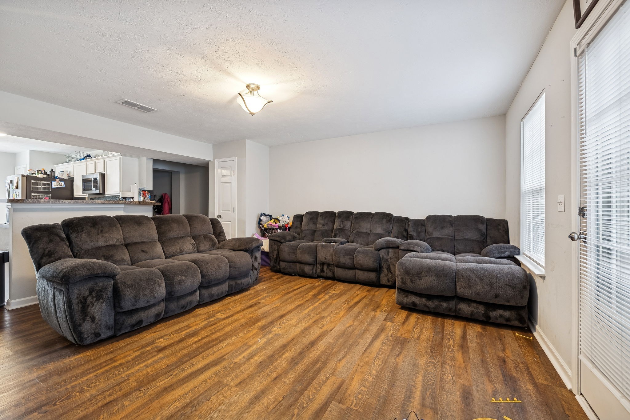 1036 Wolves Den Place Murfreesboro, TN 37128 - Photo 9 of 15 a living room with furniture and a flat screen tv
