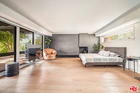 a view of living room with furniture and a flat screen tv