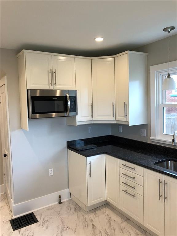 1317 Freeport Road Natrona Heights, PA 15065 - Photo 12 of 24 Light and bright kitchen with solid surface counters and recessed lighting