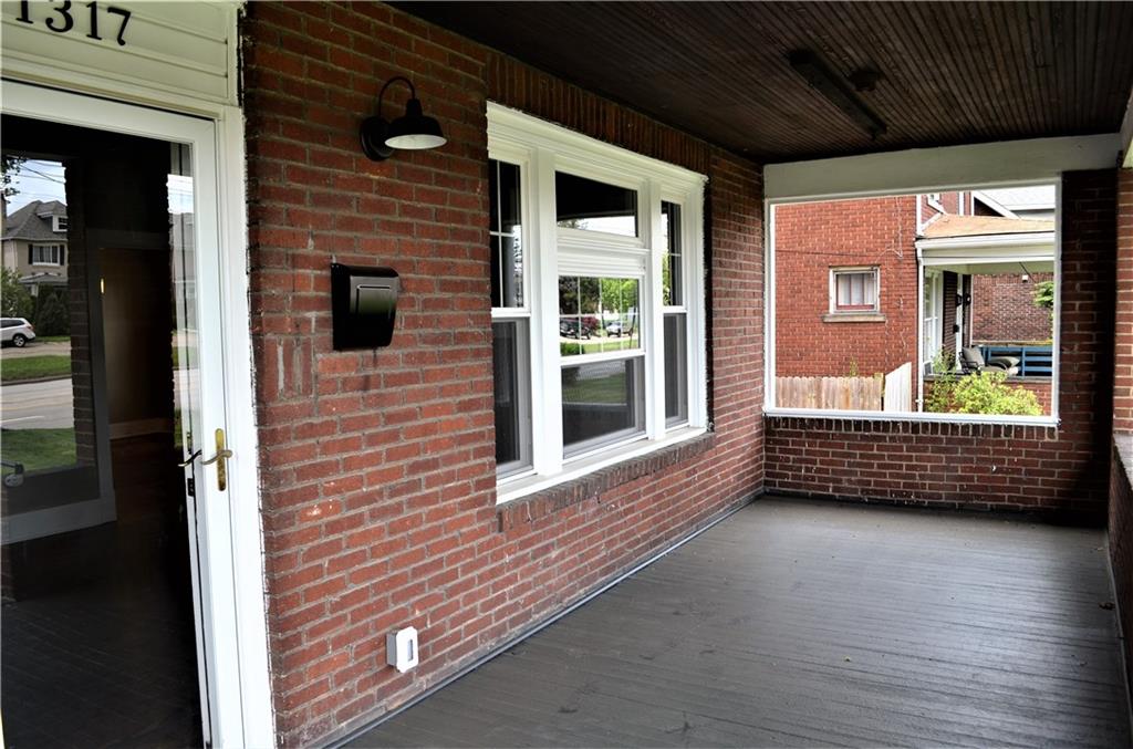 1317 Freeport Road Natrona Heights, PA 15065 - Photo 3 of 24 A perfect place for a porch swing!