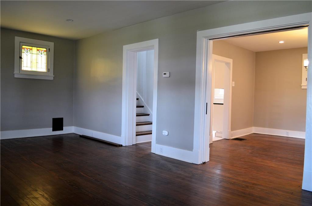 1317 Freeport Road Natrona Heights, PA 15065 - Photo 8 of 24 A pocket door separates the living room and dining room