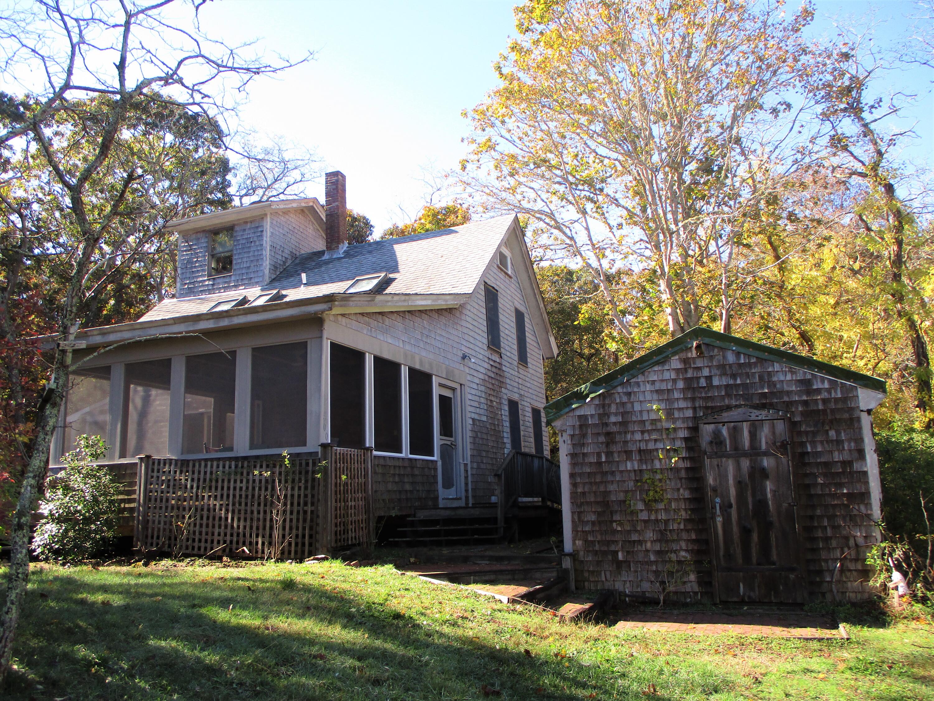 500 Gull Pond Road Wellfleet, MA 02667 - Photo 2 of 62 a view of a house with a yard