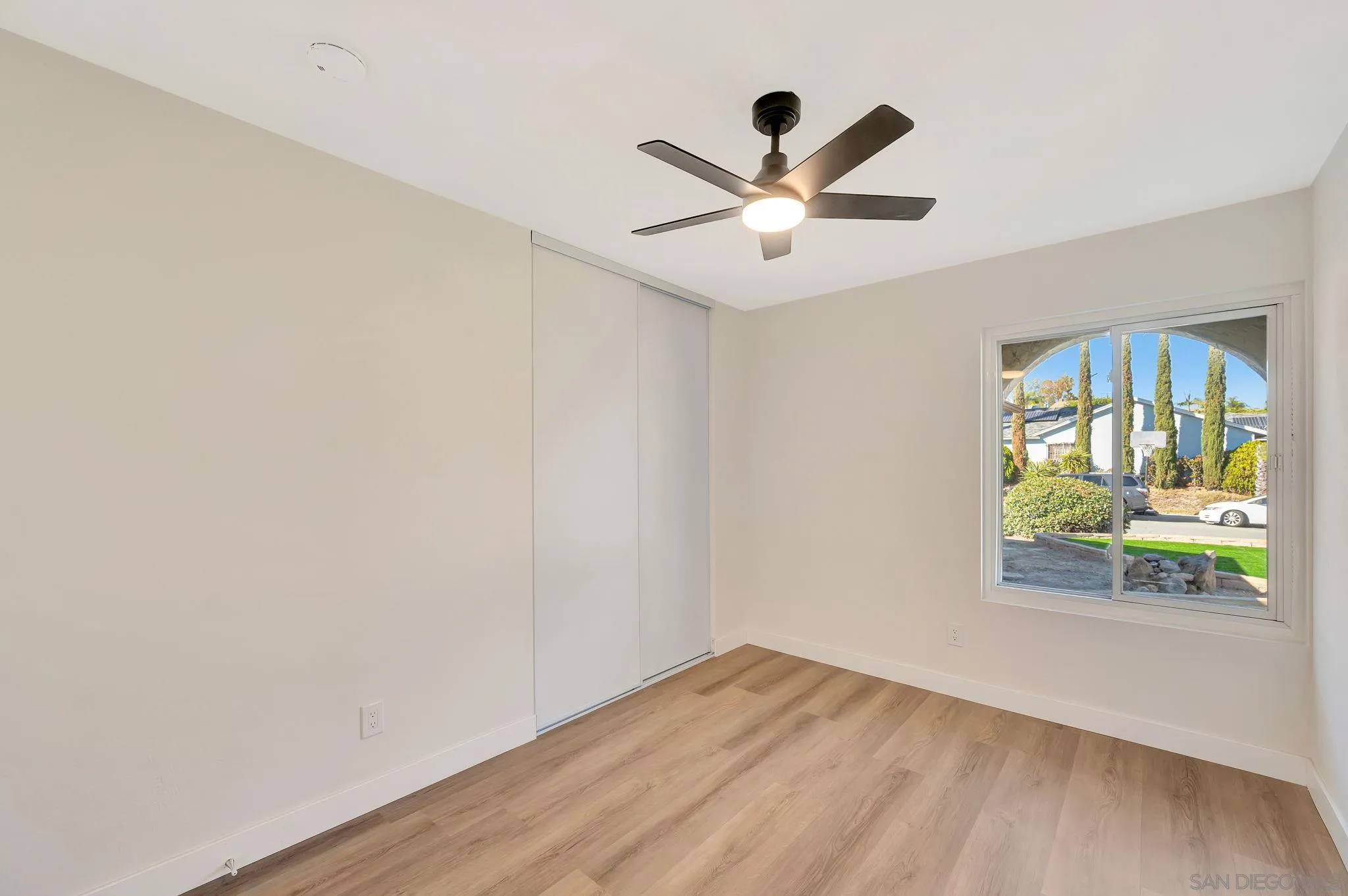 9421 Avenida Acero Spring Valley, CA 91977 - Photo 27 of 47 wooden floor in an empty room with a window