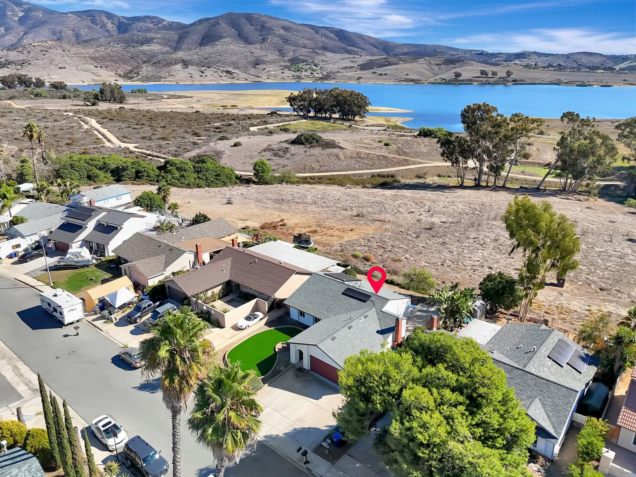 9421 Avenida Acero Spring Valley, CA 91977 - Photo 40 of 47 an aerial view of residential houses with outdoor space