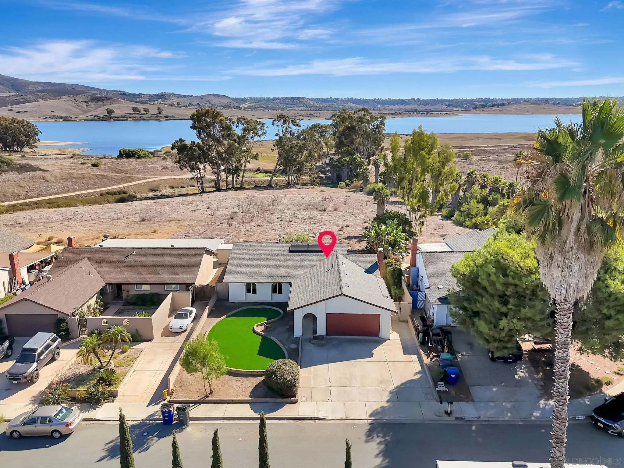 9421 Avenida Acero Spring Valley, CA 91977 - Photo 41 of 47 an aerial view of residential houses with outdoor space and ocean view