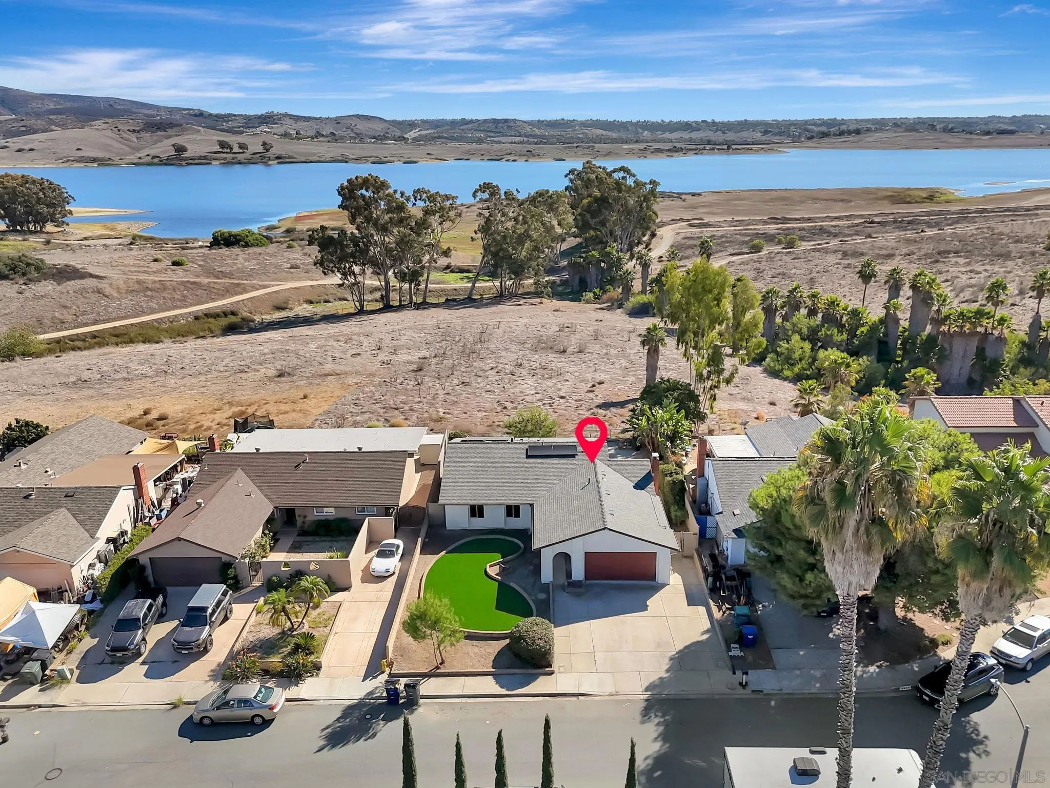 9421 Avenida Acero Spring Valley, CA 91977 - Photo 43 of 47 a view of a terrace with wooden floor and outdoor space