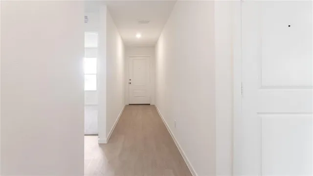 a picture of a wall with a white building