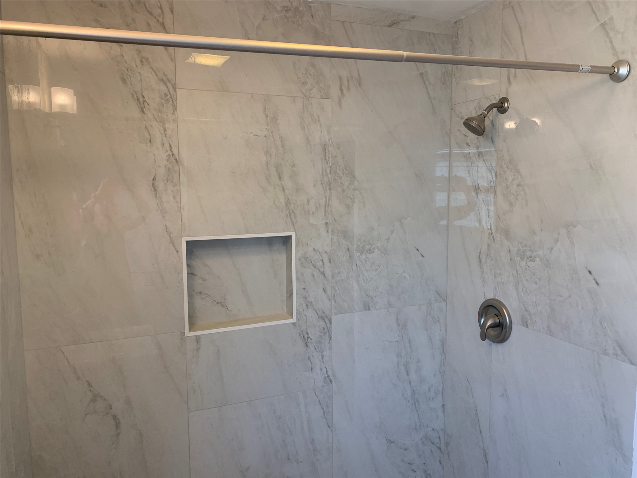 307 Avondale Street, Unit 1 5 Houston, TX 77006 - Photo 16 of 20 a bathroom with a shower and a shower head