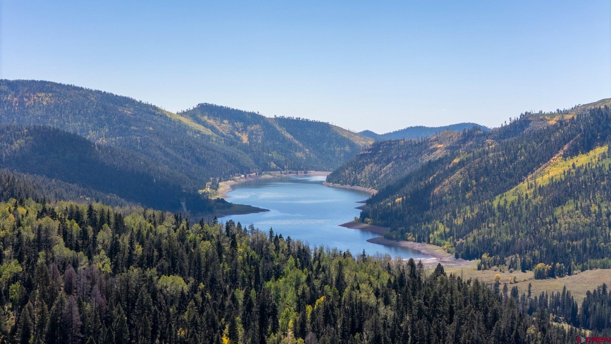 1515 County Road 243 Durango, CO 81301 - Photo 8 of 43 a view of a dry yard with wooden fence