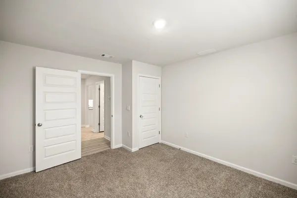 an empty room with closet