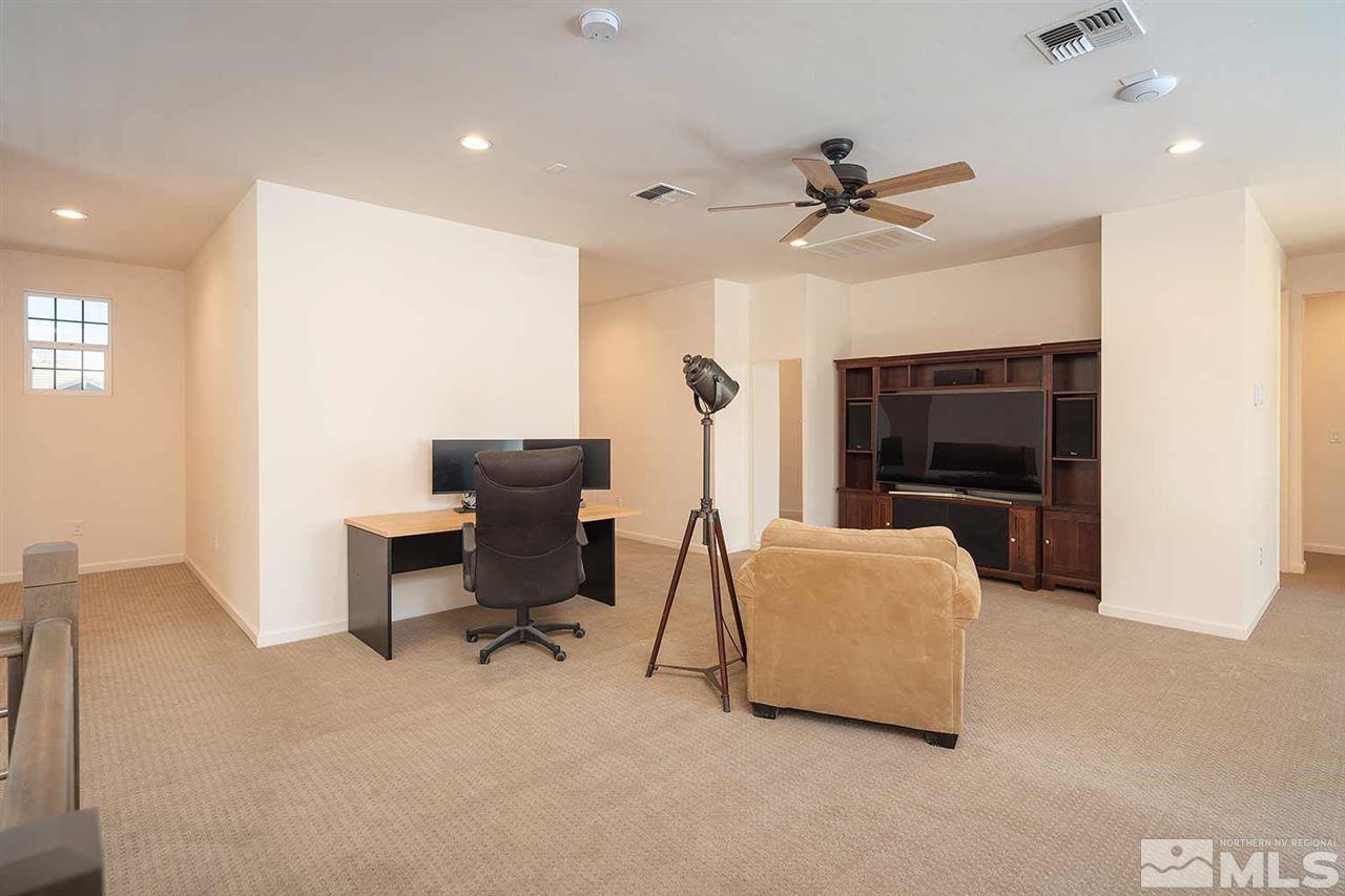 9404 Hawkshead Road Reno, NV 89521 - Photo 15 of 22 a living room with furniture