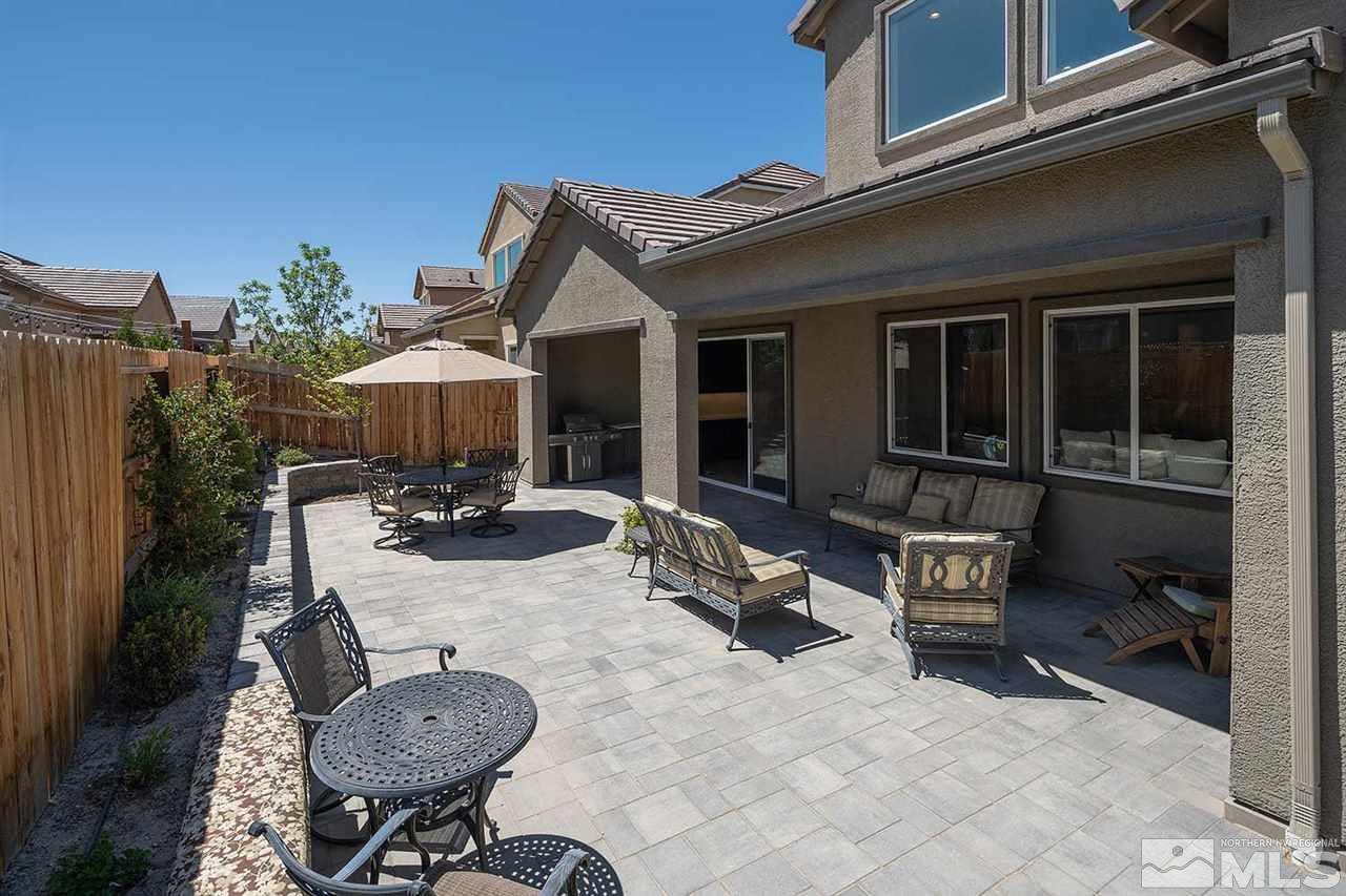 9404 Hawkshead Road Reno, NV 89521 - Photo 21 of 22 a view of a house with sitting area and furniture