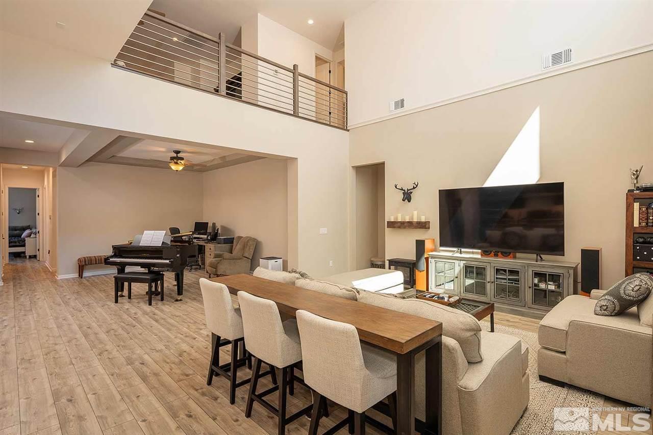 9404 Hawkshead Road Reno, NV 89521 - Photo 5 of 22 a view of a dining room with furniture