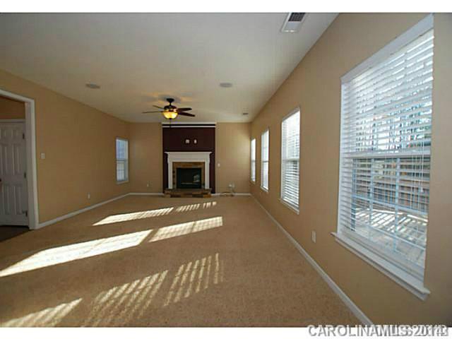7155 Meyer Road Fort Mill, SC 29715 - Photo 3 of 14 a view of livingroom with furniture and chandelier