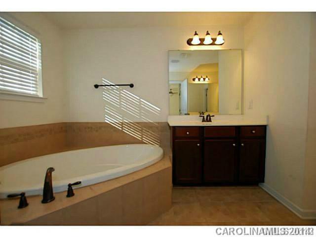 7155 Meyer Road Fort Mill, SC 29715 - Photo 10 of 14 a bathroom with a sink and a mirror