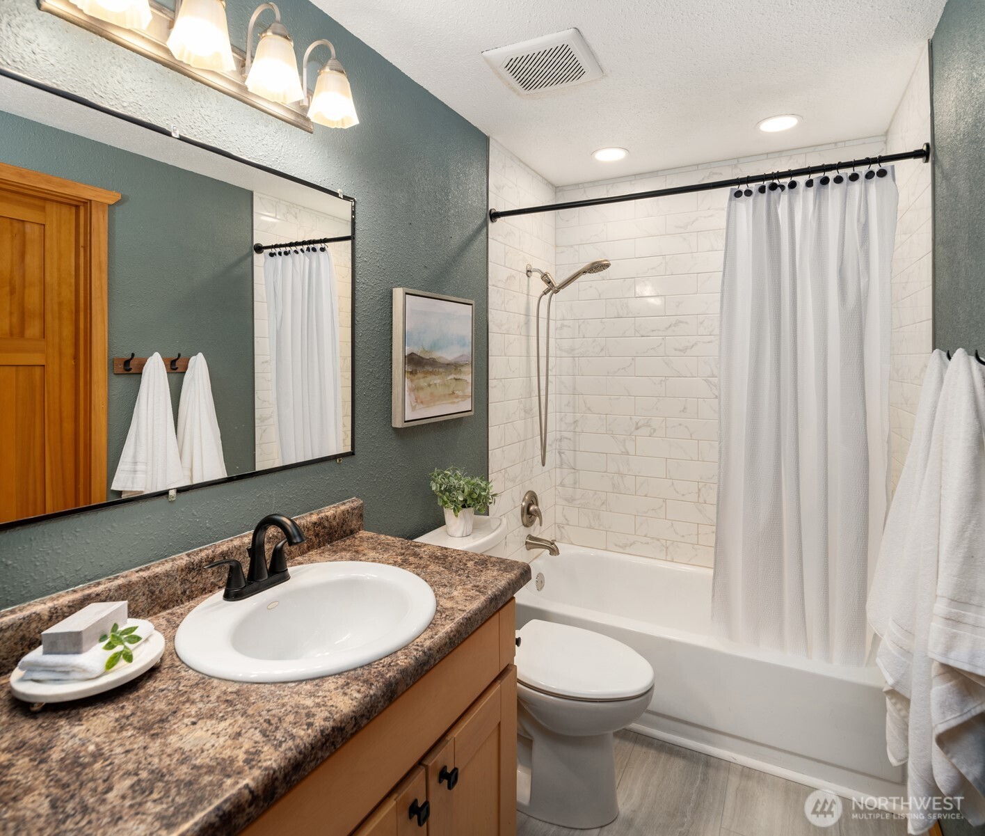 418 212th Street Southwest Bothell, WA 98021 - Photo 20 of 40 a bathroom with a granite countertop sink toilet and shower
