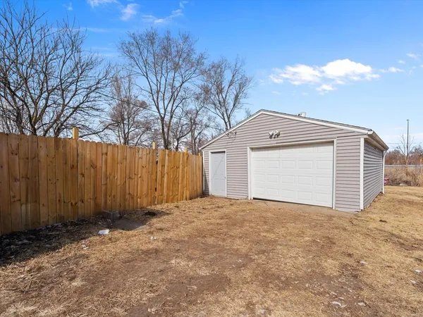 a view of a house with a garage