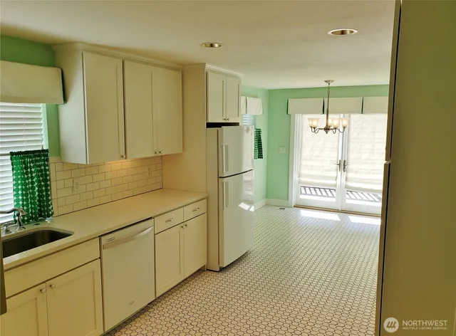 a bathroom with a shower and a tub