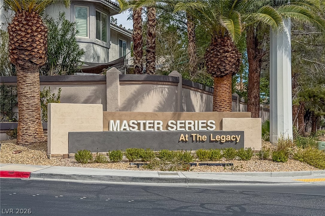 2504 Putting Green Drive Henderson, NV 89074 - Photo 2 of 56 Welcome to the exclusive community of The Legacy, featuring elegant landscaping and a grand entrance.