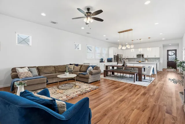 a view of a chairs and table in patio