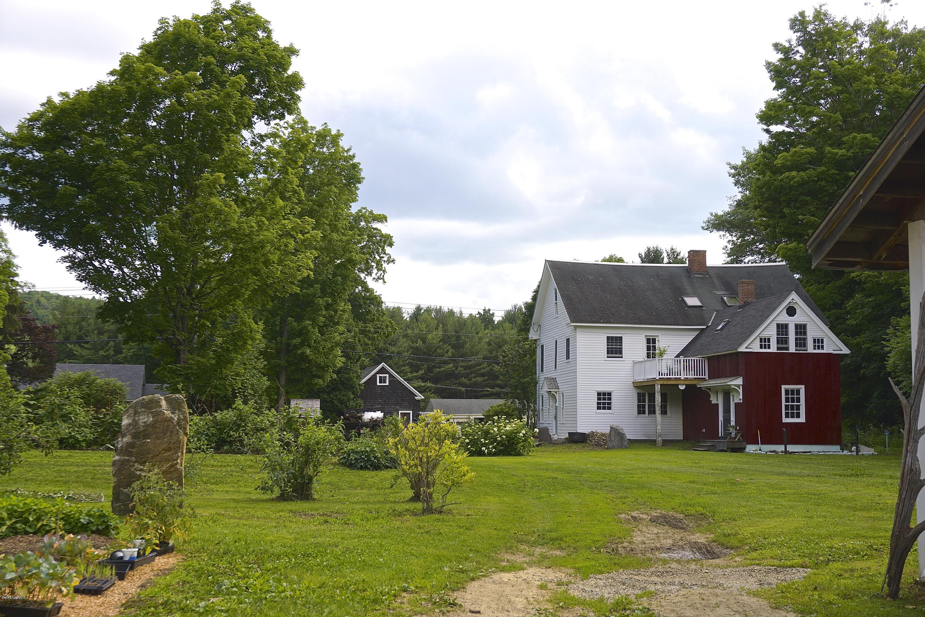 519 Main Road Monterey, MA 01245 - Photo 2 of 28 a view of a yard in front of house