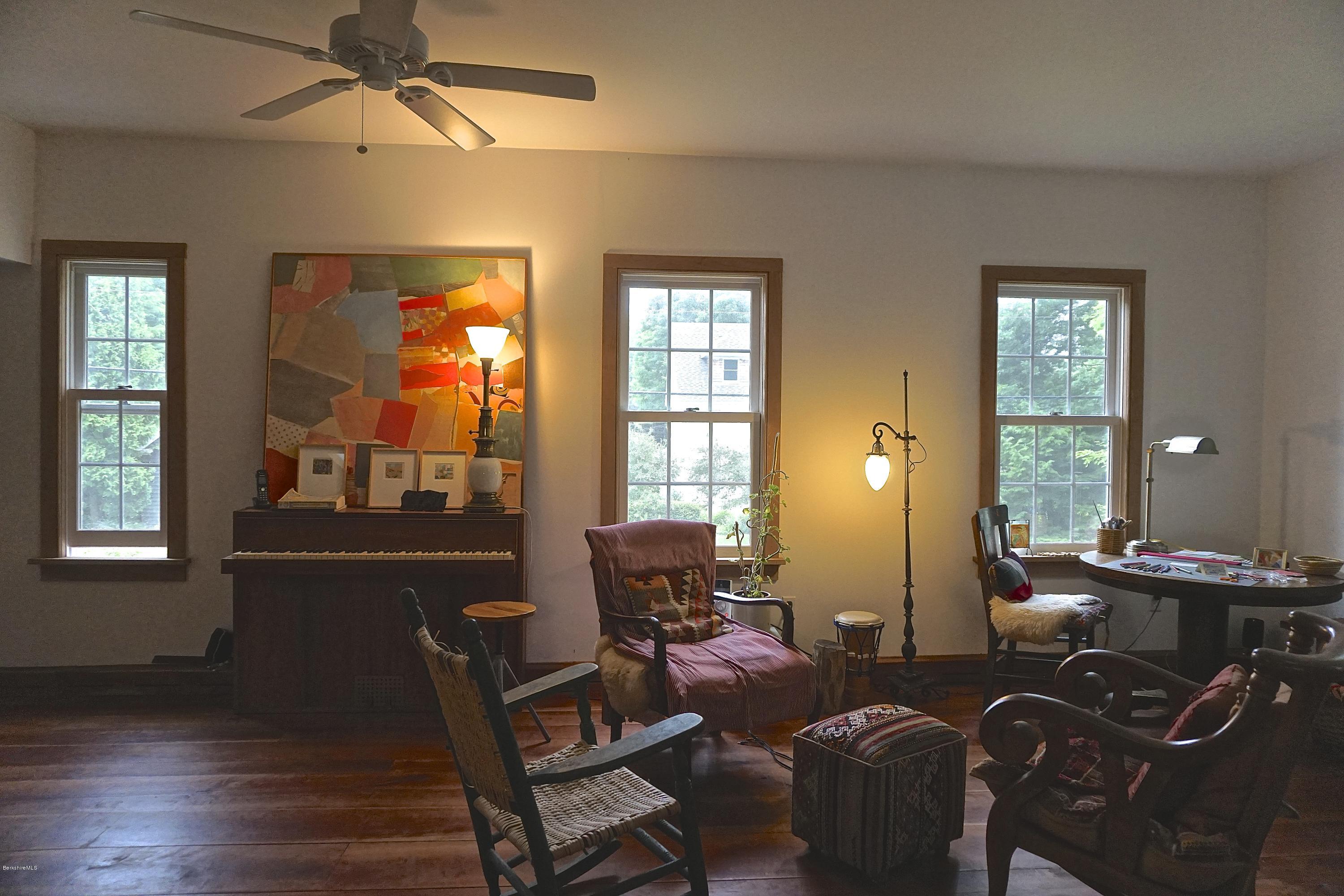519 Main Road Monterey, MA 01245 - Photo 15 of 28 a living room with furniture and wooden floor