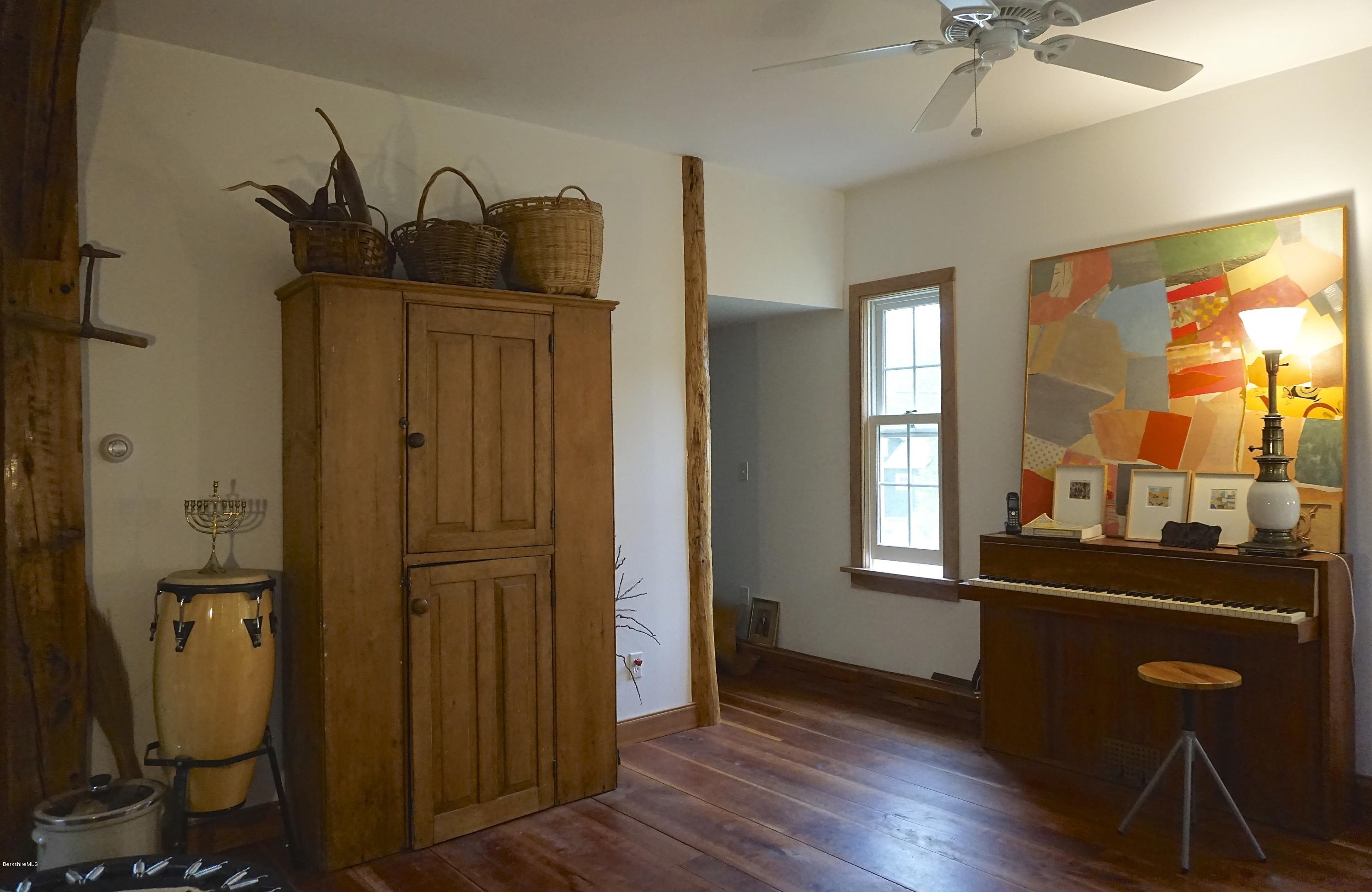 519 Main Road Monterey, MA 01245 - Photo 16 of 28 a view of a hallway with wooden floor