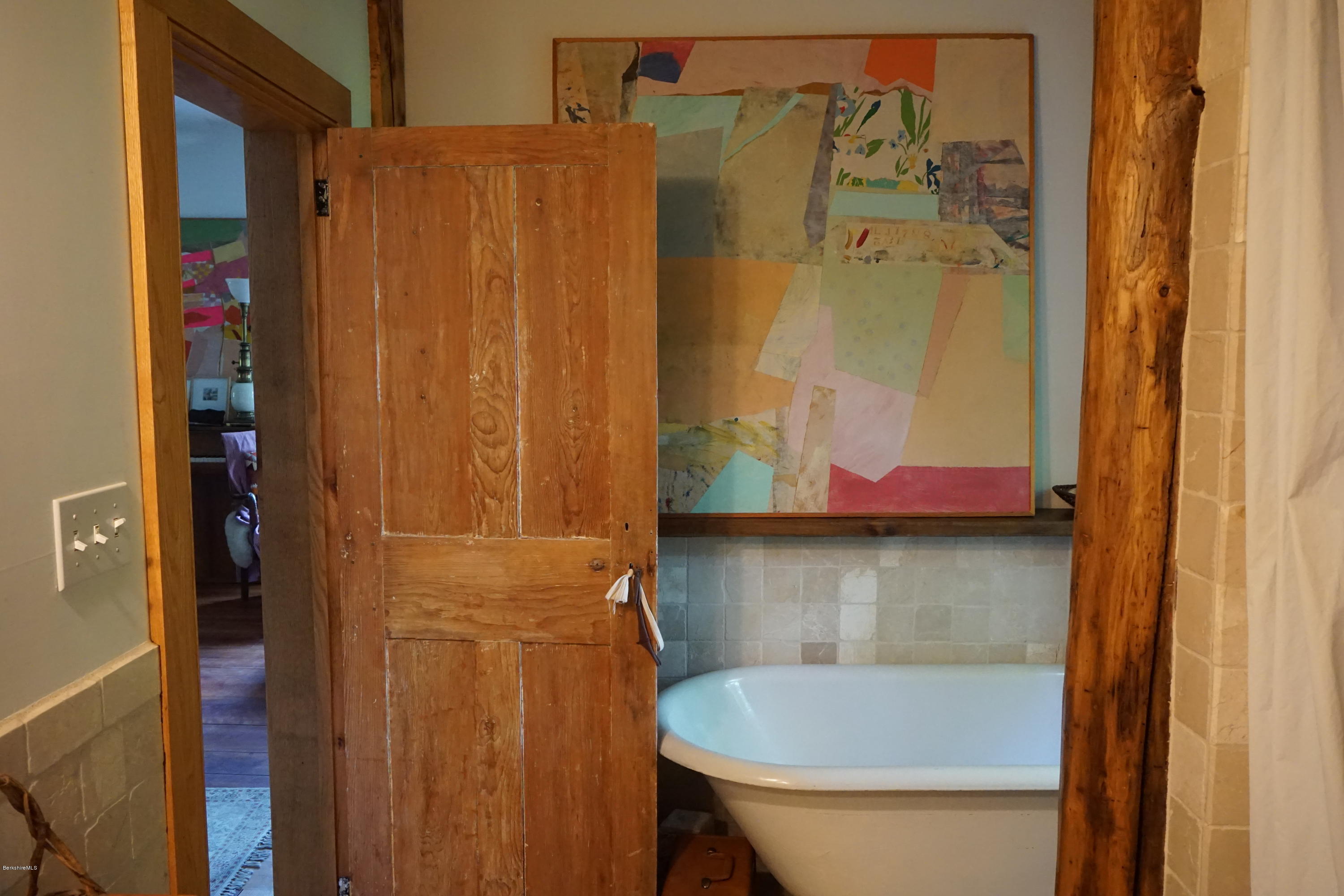 519 Main Road Monterey, MA 01245 - Photo 19 of 28 a bathroom with a shower curtain and a sink