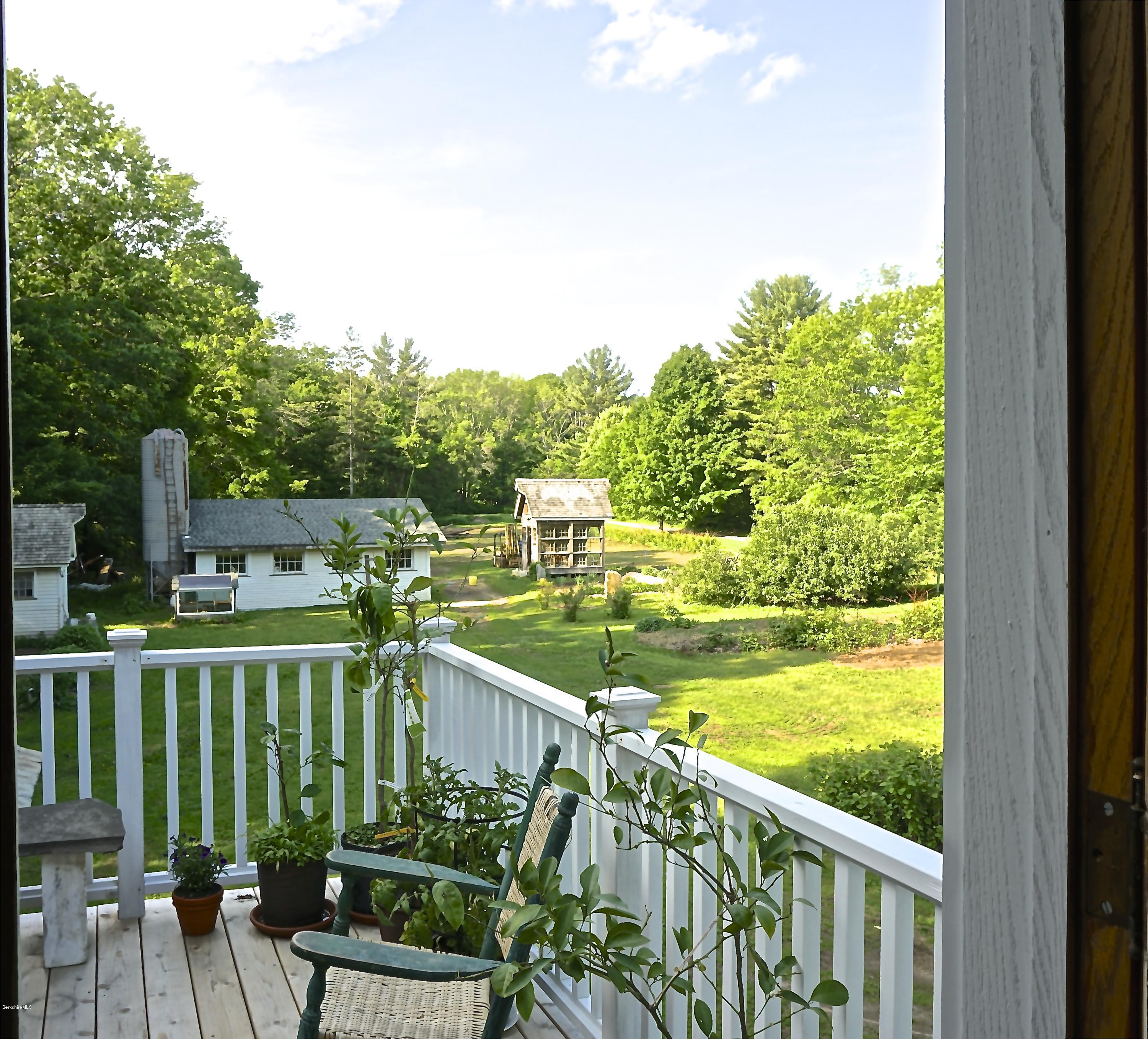 519 Main Road Monterey, MA 01245 - Photo 21 of 28 a view of a balcony with outdoor seating