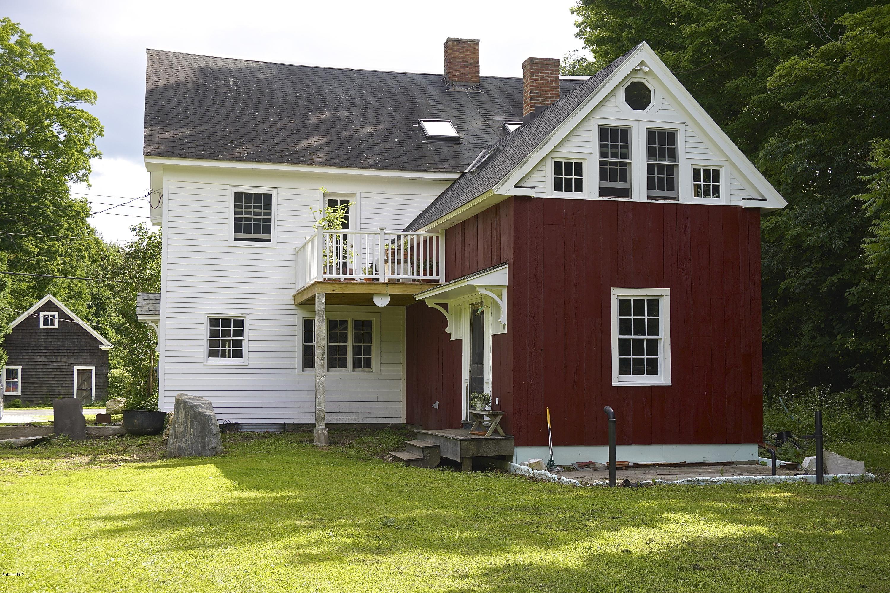 519 Main Road Monterey, MA 01245 - Photo 22 of 28 a front view of house with yard and green space