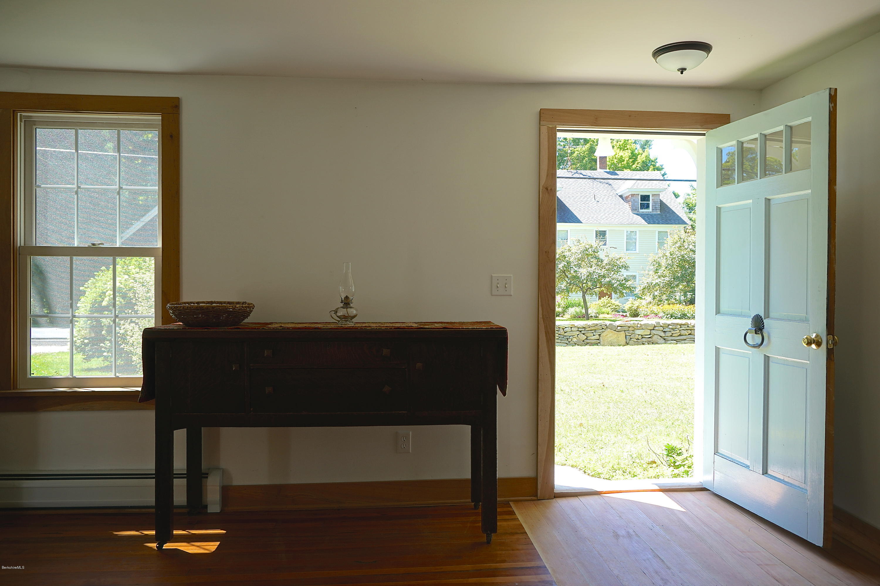 519 Main Road Monterey, MA 01245 - Photo 5 of 28 a living room with furniture and a window