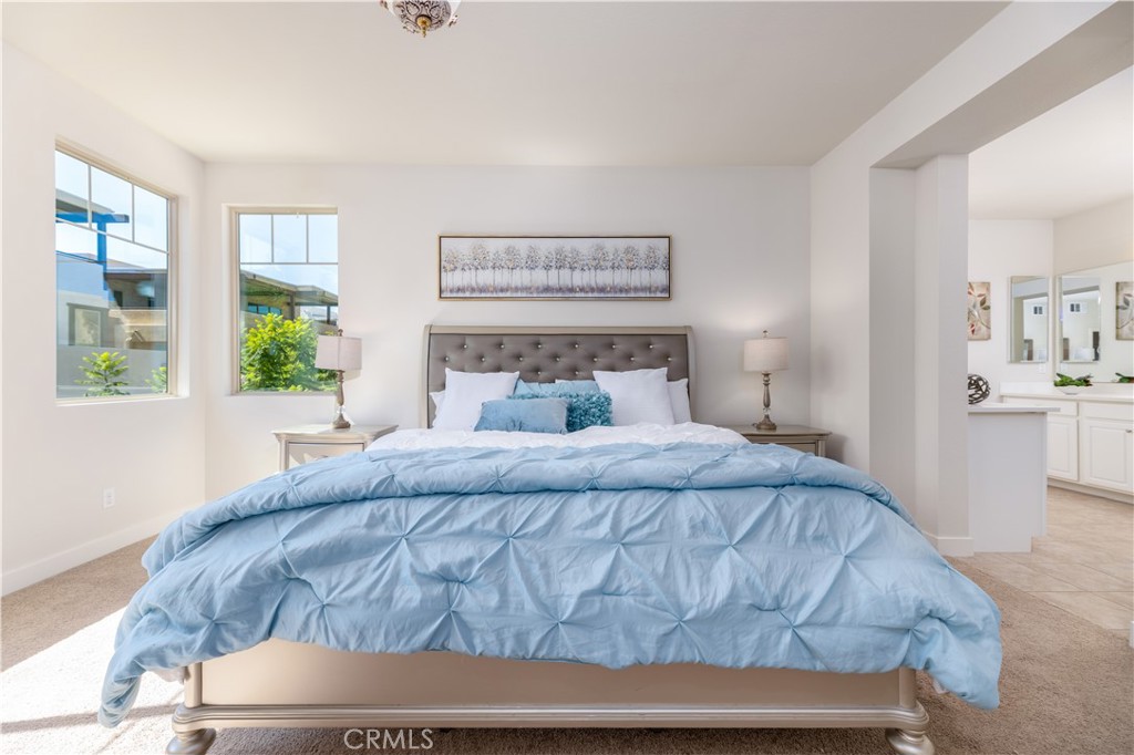 126 Interval Irvine, CA 92618 - Photo 16 of 47 a bedroom with a bed and window