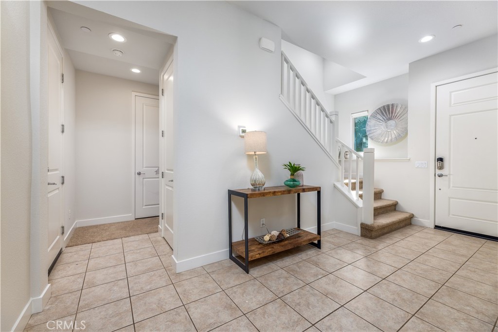 126 Interval Irvine, CA 92618 - Photo 3 of 47 a room with furniture and wooden floor