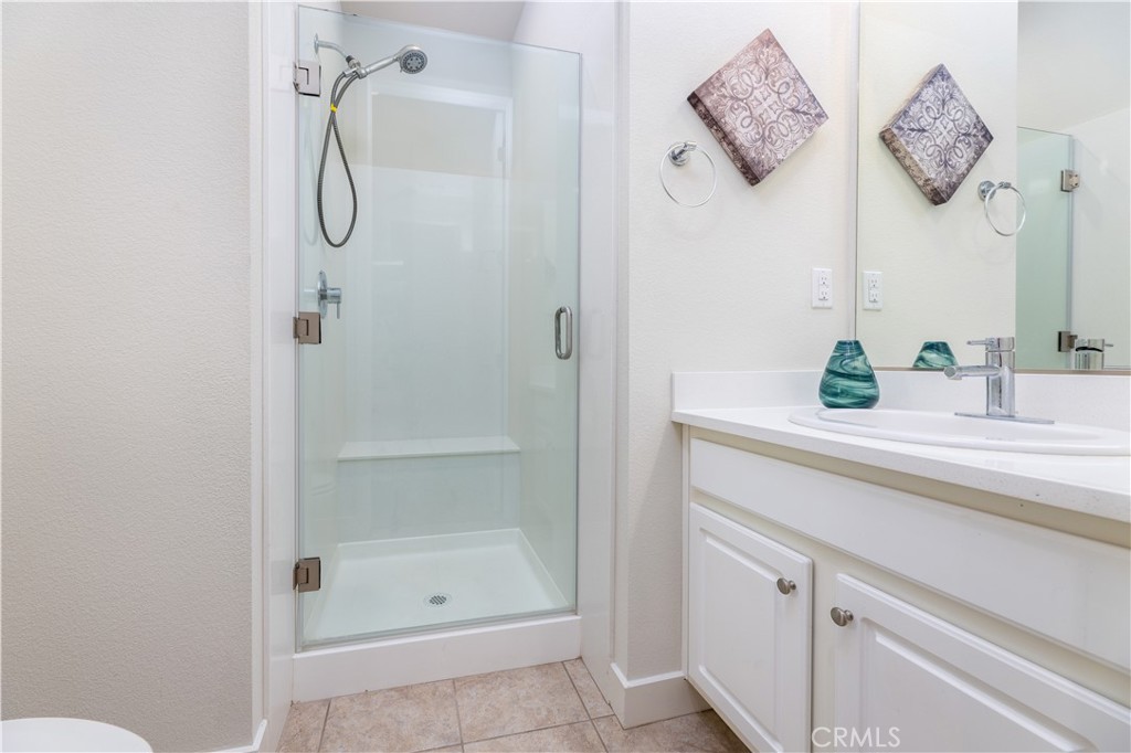 126 Interval Irvine, CA 92618 - Photo 4 of 47 a bathroom with a shower and a sink