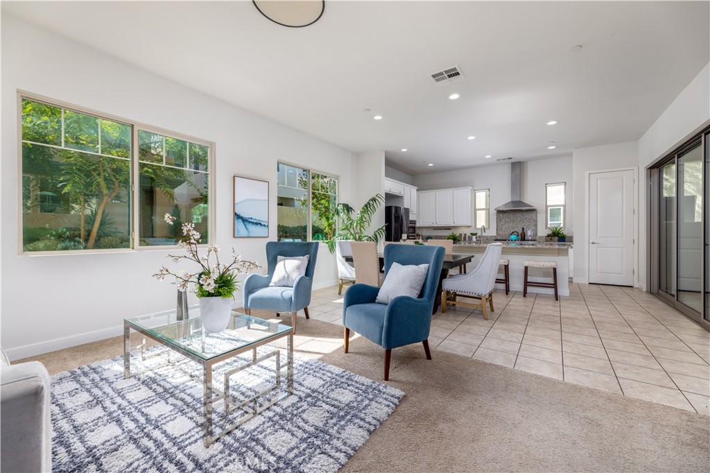 126 Interval Irvine, CA 92618 - Photo 6 of 47 a living room with furniture and a table