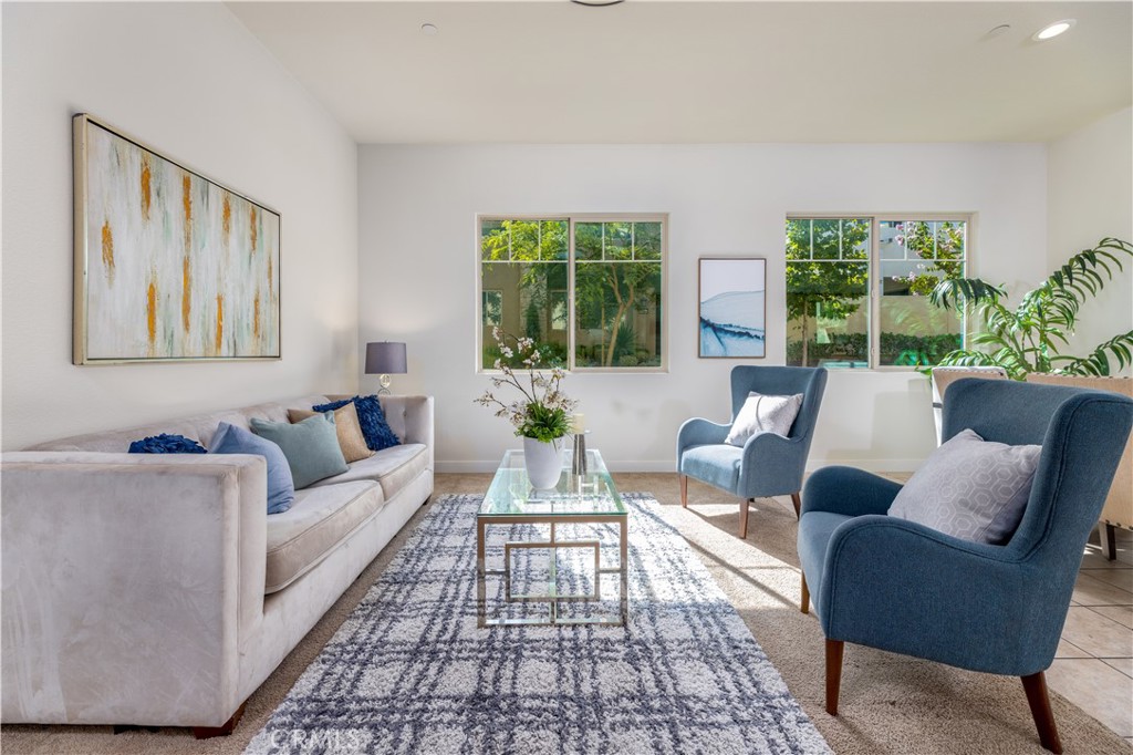 126 Interval Irvine, CA 92618 - Photo 7 of 47 a living room with furniture and a large window