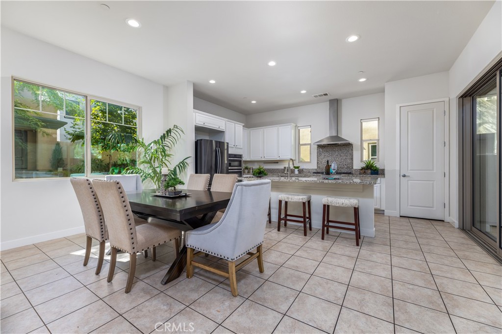 126 Interval Irvine, CA 92618 - Photo 10 of 47 a view of a dining room with furniture