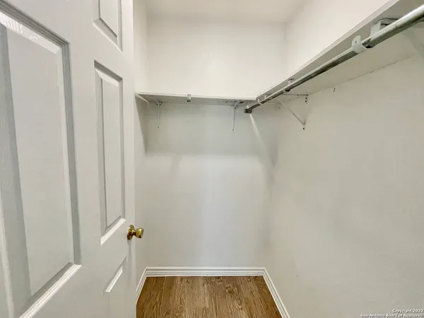 a bathroom with a tub and shower