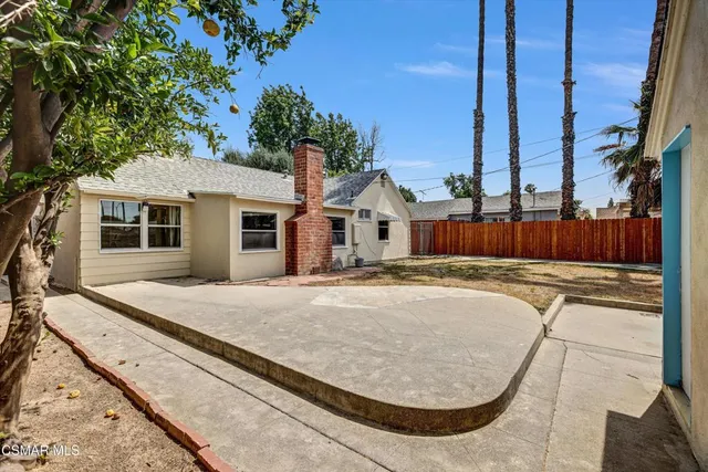 front view of a house with a garden