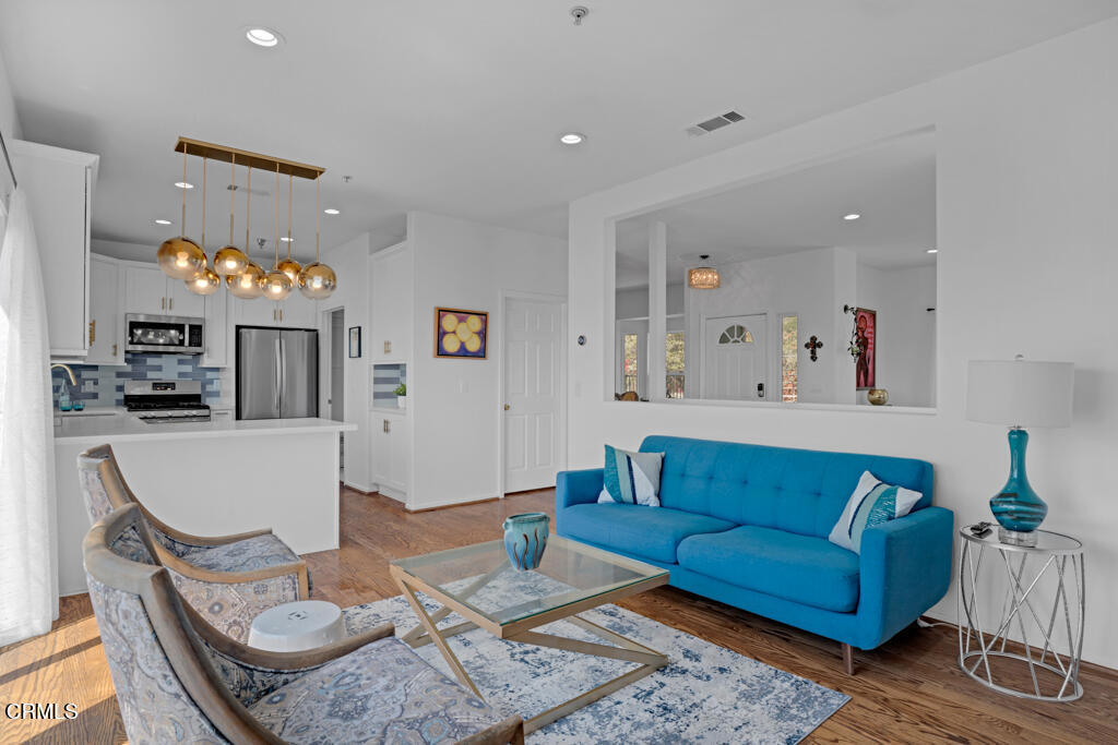 1300 Blue Hill Road Los Angeles, CA 90041 - Photo 15 of 54 a living room with furniture and kitchen view