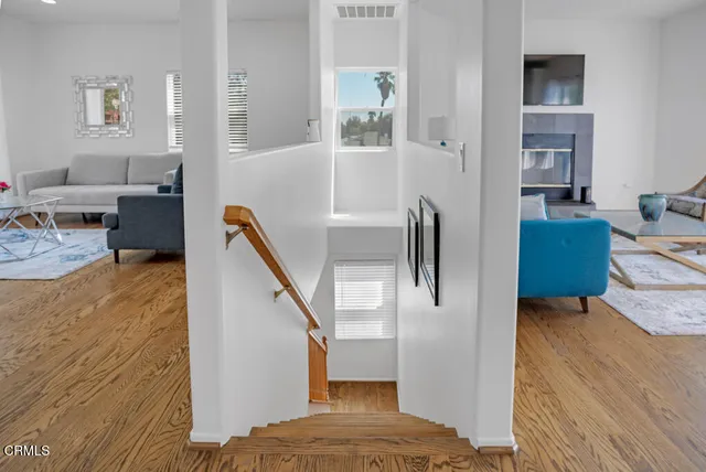 a view of front door with wooden floor