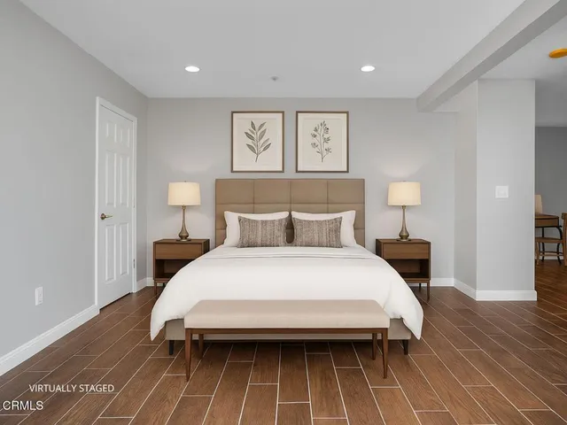 a bathroom with a sink vanity mirror and shower